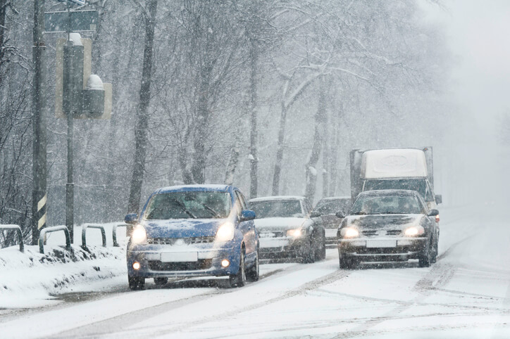 Cars driving on a snowy road